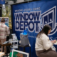 People attending a Window Depot USA of Lafayette and Big Brothers and Big Sisters Event.